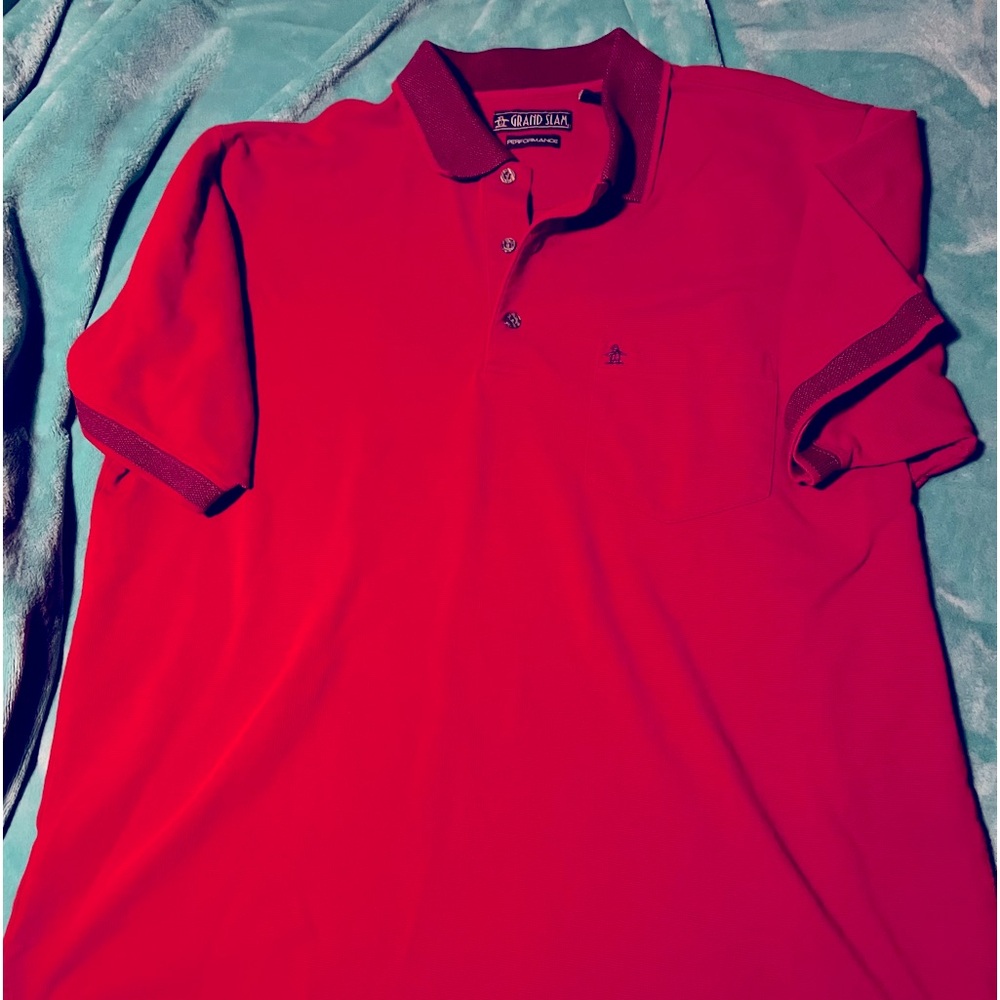Like new Penguin Grand Slam Performance red polo shirt.